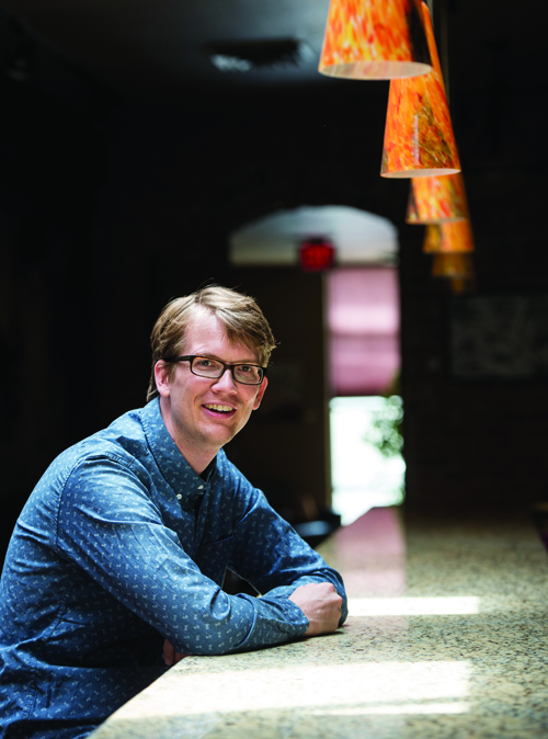 UM alumnus Hank Green poses at The Loft in downtown Missoula. “He’s just Hank to us—our goofy, creative, smart friend,” says journalist Courtney Lowery Cowgill. “But he’s a total celebrity to everyone else.” (Photo by Todd Goodrich)